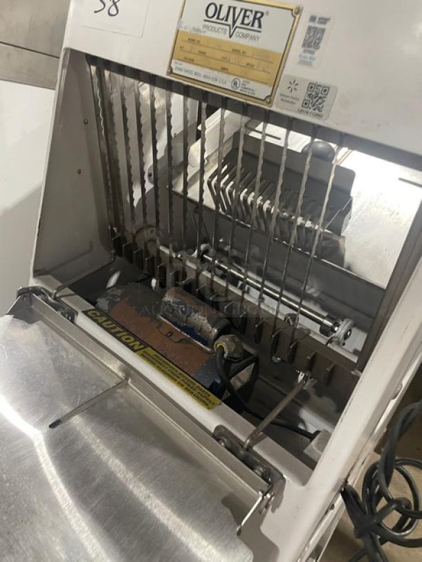 Oliver Model 797-32-NC bread slicer, gravity feed, stainless steel worktop, electric, 115V, 1 phase, on casters, serial 164680.