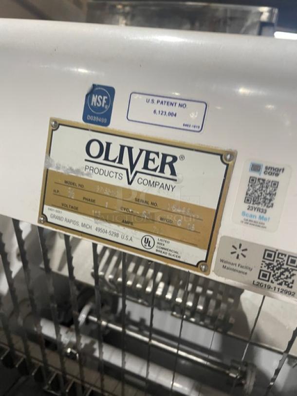 Oliver Model 79732NC commercial bread slicer, white, stainless steel worktop, electric 115V, on casters, NSF certified.