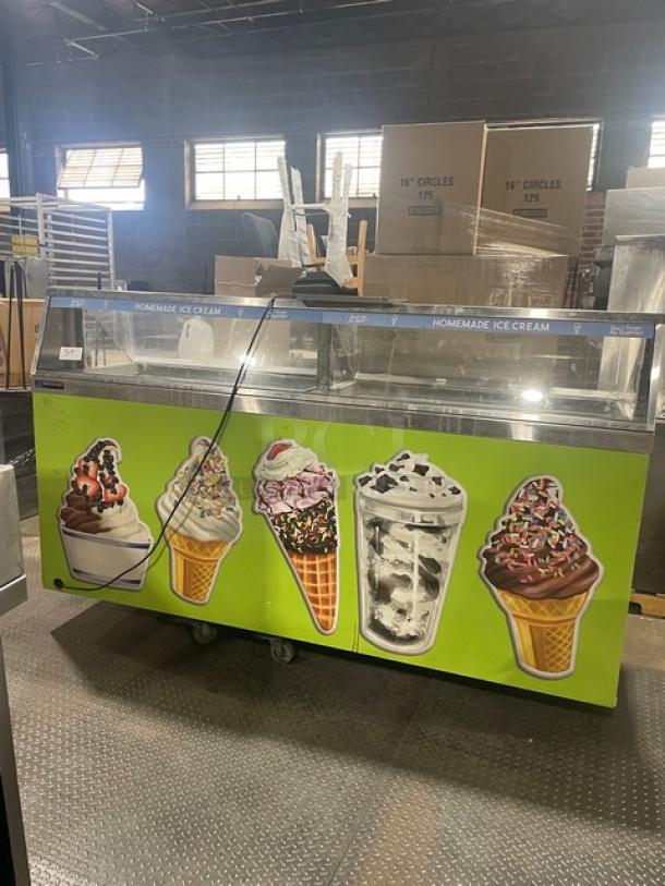 Master-Bilt commercial ice cream dipping cabinet with serve-over sneeze guard, rear lift-open access, and poly coated wire rack.