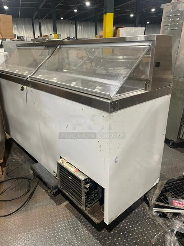 Master-Bilt commercial ice cream dipping cabinet with serve-over sneeze guard, rear lift-open access, and poly-coated wire rack.