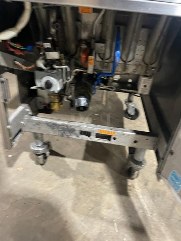 Pitco Solstice Supreme SSH75 fryer on casters, featuring stainless steel construction and visible internal components.