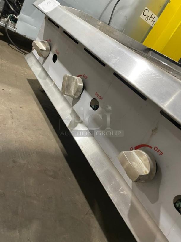 CPG CBR36 stainless steel countertop char broiler with cast iron grates, back and side splash, on legs, serial 1708002288.