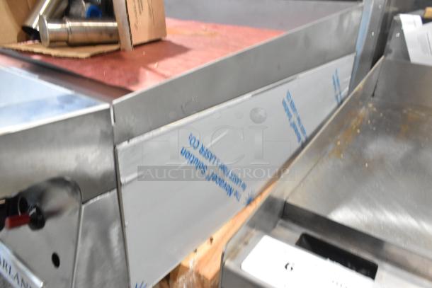 Brand new Garland stainless steel natural gas flat top griddle, scratch and dent condition, commercial countertop model.