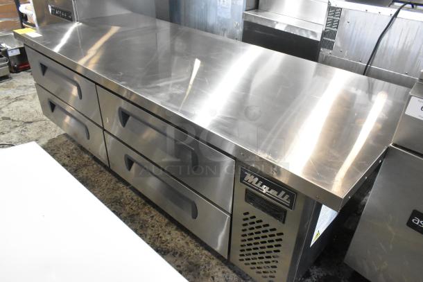 Brand new Migali C-CB72-76-HC stainless steel 4-drawer chef base; commercial casters, 115V, minor scratches.