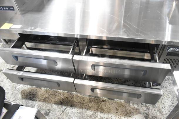 BRAND NEW Migali C-CB72-76-HC stainless steel 4-drawer chef base on casters, 115V, 1 phase, with minor scratches.