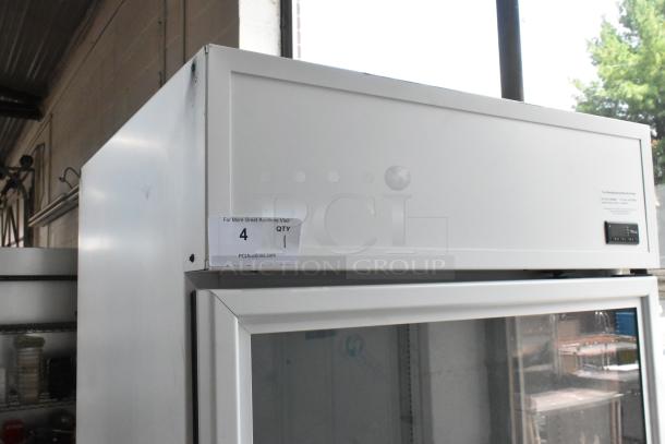 Brand new 2021 True TSCI-600R-G-PH single door cooler merchandiser with poly coated racks, 115 Volts, 1 Phase.