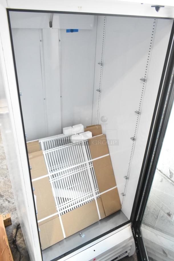 Brand new 2021 True TSCI-600R-G-PH commercial cooler, single glass door, poly coated racks, minor scratches, 115V, 1 phase.
