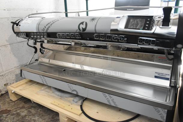 Brand new Nuova Simonelli Aurelia Wave 3 Group Volumetric Espresso Machine, stainless steel, with 4 portafilters, 2 steam wands, 220V.
