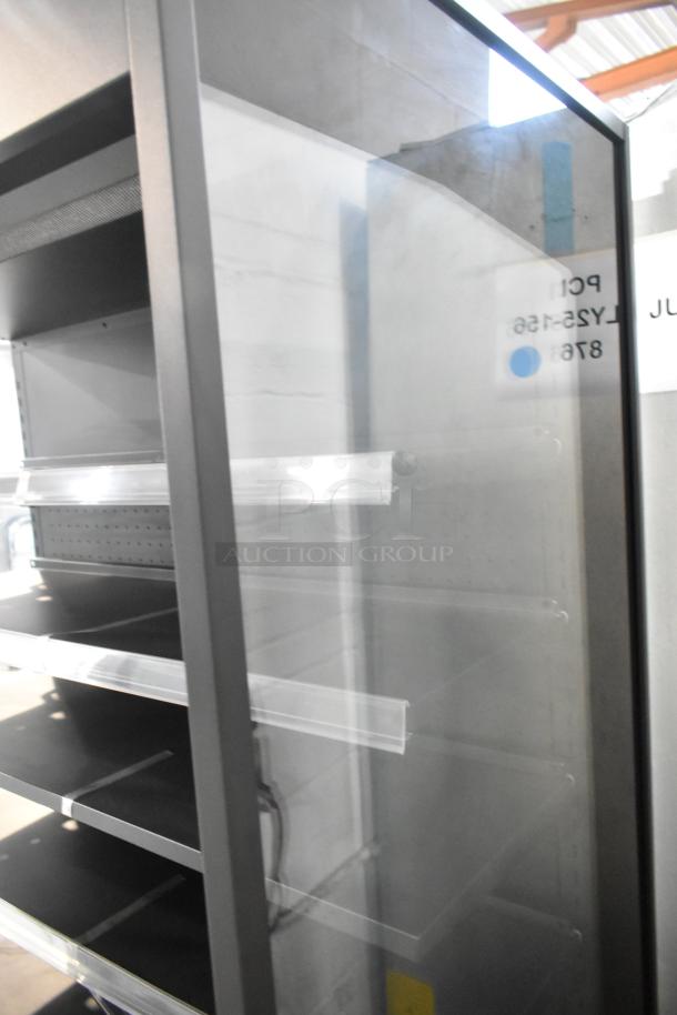 Brand new Avantco 193VOA48B merchandiser with LED lighting, showing broken left side glass pane. 115V, 1 Phase.