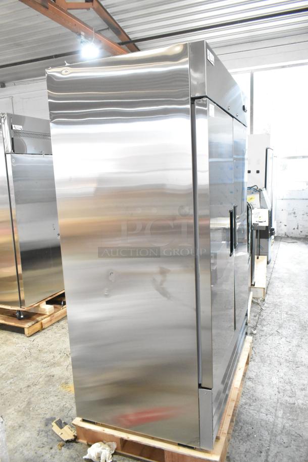 Brand new Avantco 178A49RHC stainless steel 2-door reach-in cooler, 115V, with visible scratches and dents.