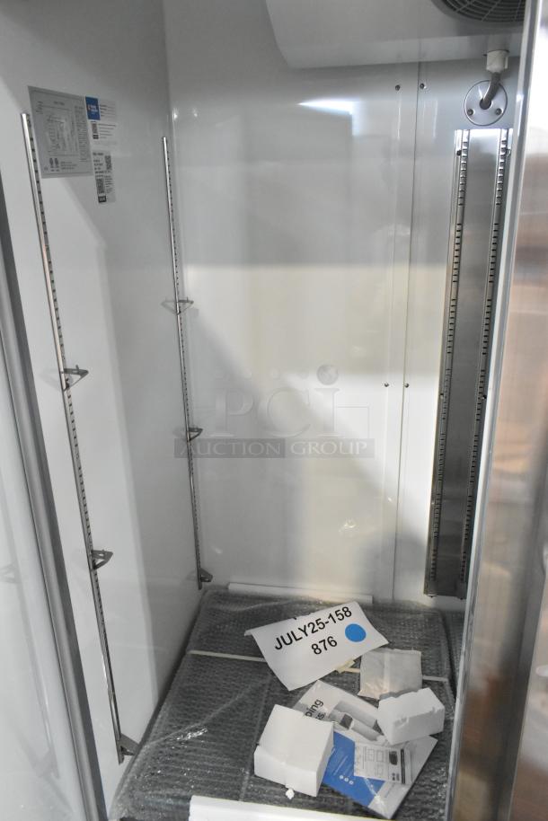 Brand new Avantco 178A49RHC stainless steel commercial 2-door reach-in cooler, 115 volts, showing interior with tags.