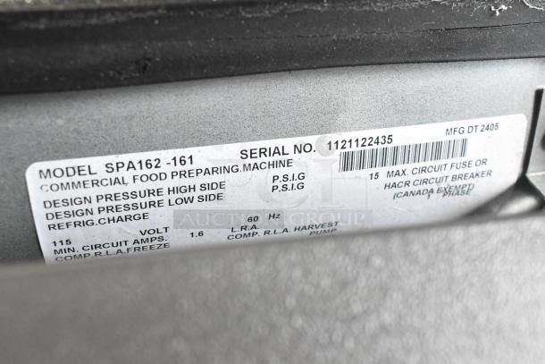 Label on Manitowoc SPA162-161 ice dispenser, showing model, serial number 1121122435, and electrical specifications.