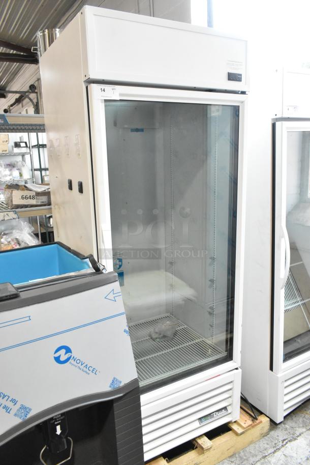 Brand new 2021 True TSCI-600R-G-PH commercial cooler, single glass door, poly-coated racks, 115V, minor scratch and dent.