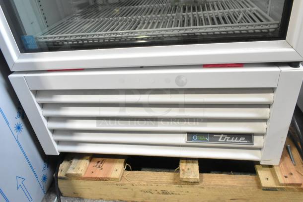 Brand new 2021 True TSCI-600R-G-PH commercial cooler, single door, metal exterior, poly-coated racks, 115V, 1 phase.