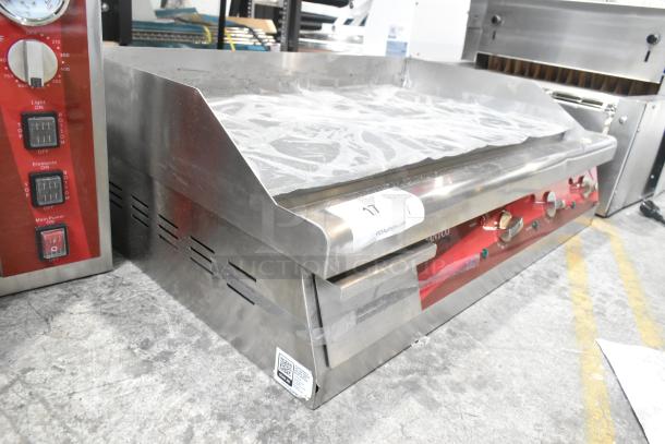 Brand new Avantco 177EG30N 30" stainless steel electric griddle, 208/240V, 1 phase, minor scratches and dents.