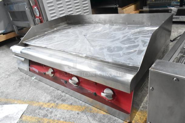 Brand new Avantco 177EG30N stainless steel electric countertop griddle, 30", 208/240V, 1 phase. Scratch and dent condition.