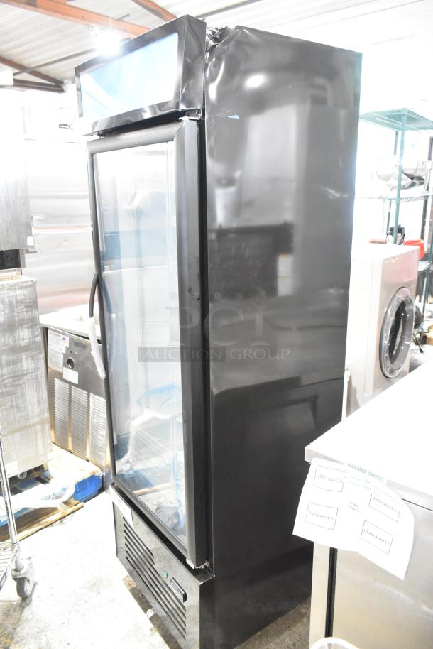 BRAND NEW Mainstreet 829GMC12B black single-door merchandiser refrigerator with swing glass door, dented top edge.