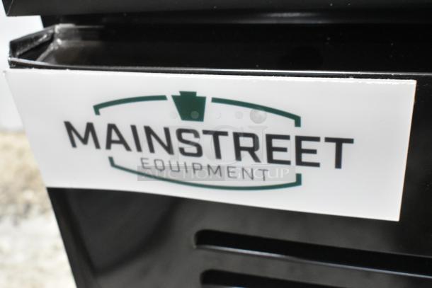 Mainstreet 829GMC12B metal merchandiser refrigerator with swing glass door. Black finish, "Mainstreet Equipment" label visible.