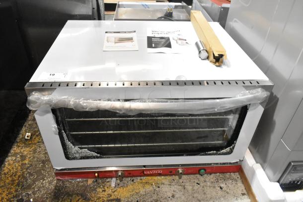 Brand new Avantco 177CO46M stainless steel countertop convection oven, 4.4 cu. ft., with broken glass, moisture injection, 208/240V.