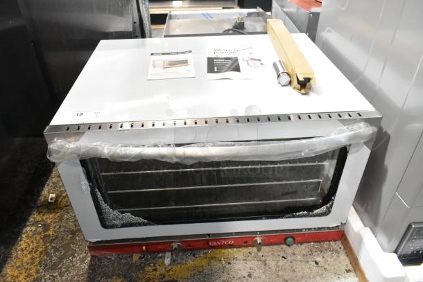Brand new Avantco 177CO46M stainless steel convection oven, 4.4 cu. ft., broken glass visible, 208/240V, 1 Phase.