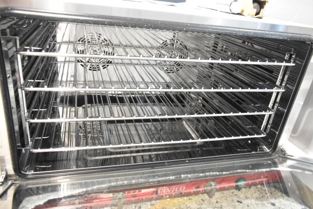 Avantco 177CO46M countertop convection oven with moisture injection, stainless steel, full size, 4.4 cu. ft., broken glass visible.