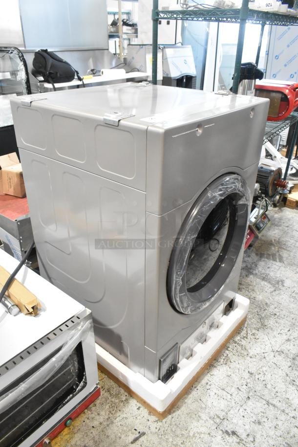 Brand new Crossover DLHS0817EC2 7 cu. ft. front load electric dryer, 27", 120/208-240V, minor scratches.