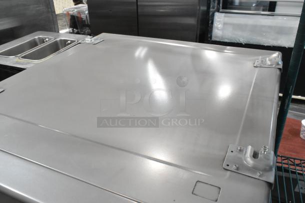 Brand new Crossover DLHS0817EC2 7 cu. ft. front load commercial dryer, 27", electric, 120/208-240 volts, with minor scratches.