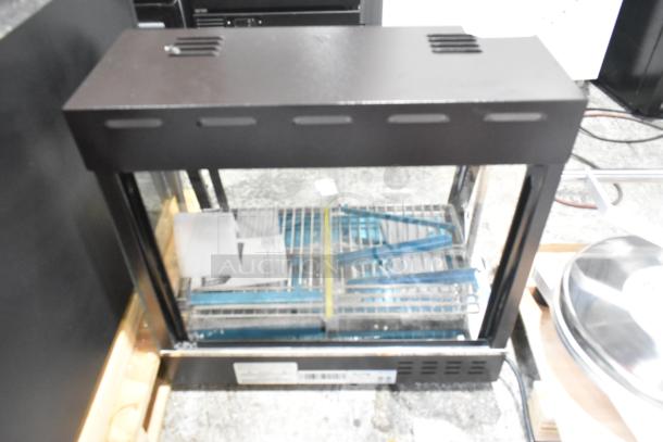 BRAND NEW SCRATCH AND DENT! 2024 Avantco 177HDC26 26" heated display case. Self/Full service, 3 shelves, sliding doors.