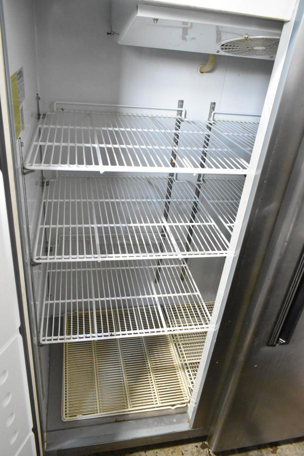 Central 69K-032HC stainless steel commercial 2-door reach-in cooler with poly-coated racks, 115V, 1 phase. Clean interior.