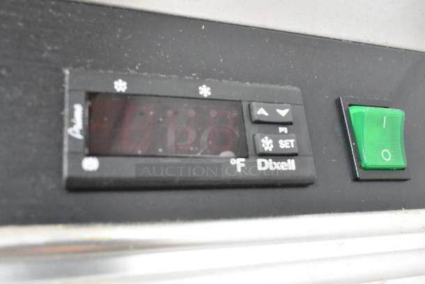 Central 69K-032HC cooler temperature control panel with Dixell display and green power switch.