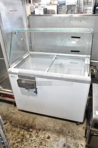 Excellence HL-11HC commercial chest freezer with sneeze guard, metal body, 115V, 1 phase, condition shows signs of use.