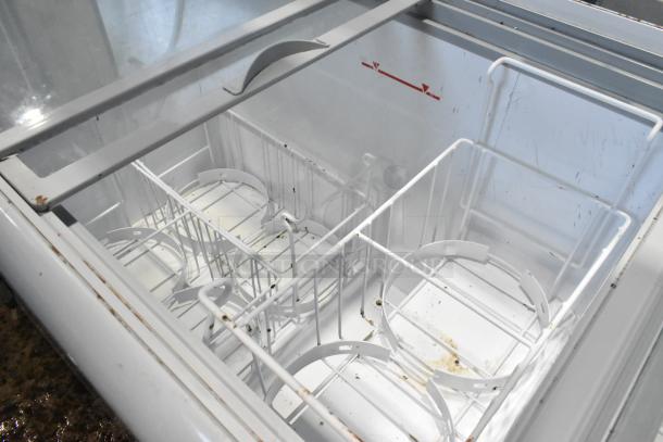 Excellence HL-11HC metal commercial chest freezer with sneeze guard, 115 volts, 1 phase, interior wire baskets visible.