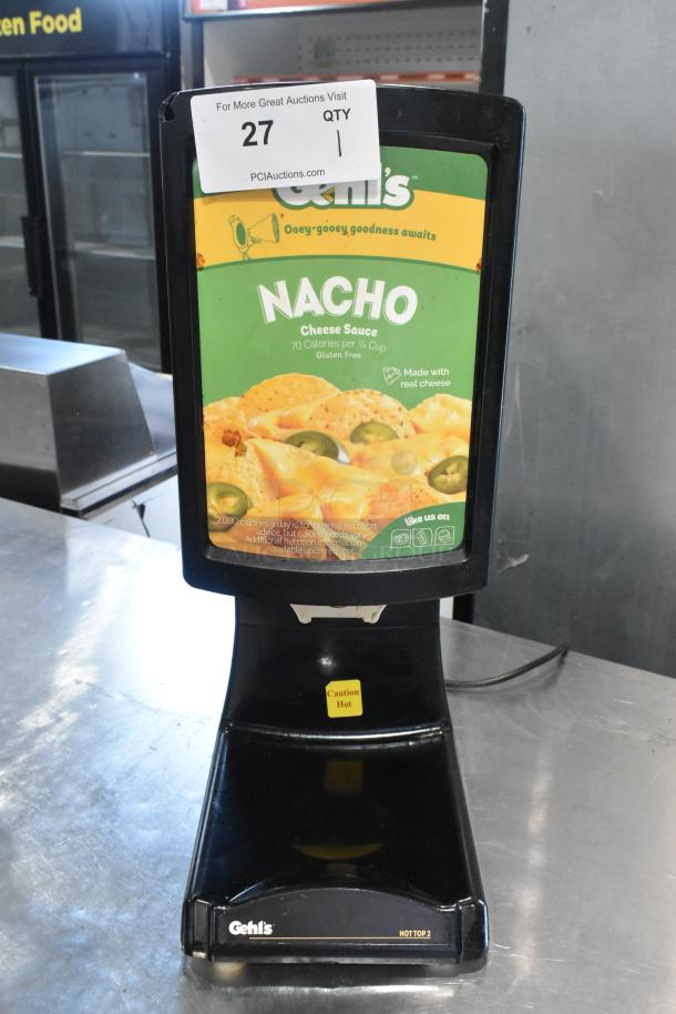 2023 Hot Top HT2-01 countertop hot cheese dispenser, 120V, 1 Phase. Black with caution label; used condition. Model HT2-01.