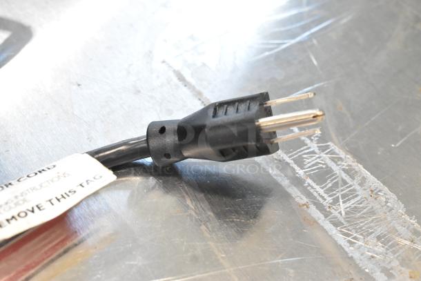 Power cord with three-prong plug for Hot Top HT2-01 cheese dispenser, showing tag reading "REMOVE THIS TAG" in good condition.