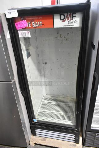 2023 True GDM-12-HC commercial single door reach-in cooler, poly-coated racks, visible sticker, Waterford MI logo, 115V, 1-phase.