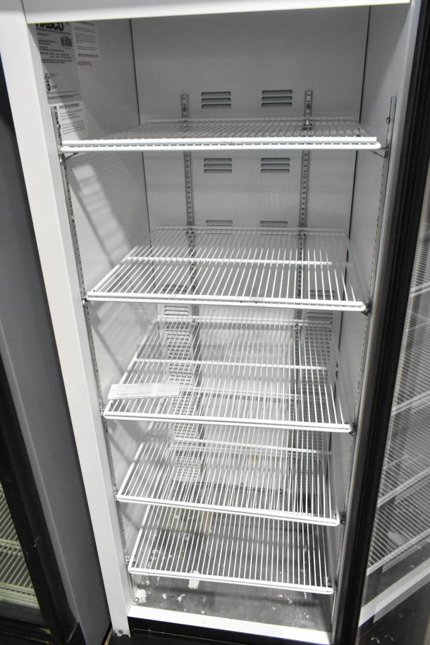 2019 Habco SE18 metal commercial single door cooler, poly coated racks, 115 volts, clean interior, excellent condition.