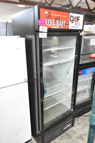 2023 True GDM-26-HC cooler merchandiser with glass door, poly-coated racks, and "Live Bait" signage. 115 Volts, 1 Phase.