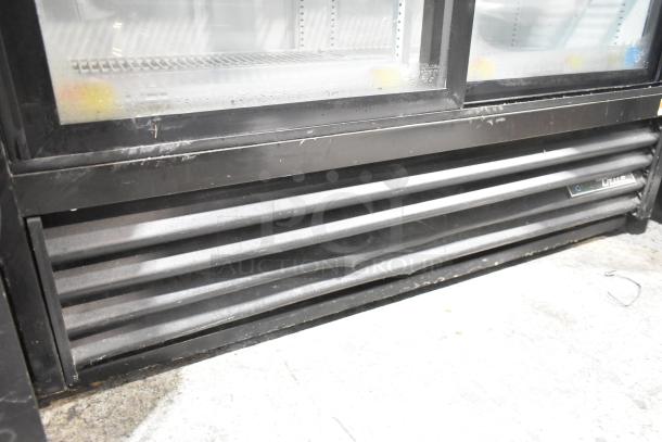 2019 True GDM-41SL-48-HC-LD commercial cooler, 2 glass doors, poly-coated racks, 115V, 1 phase, visible wear.