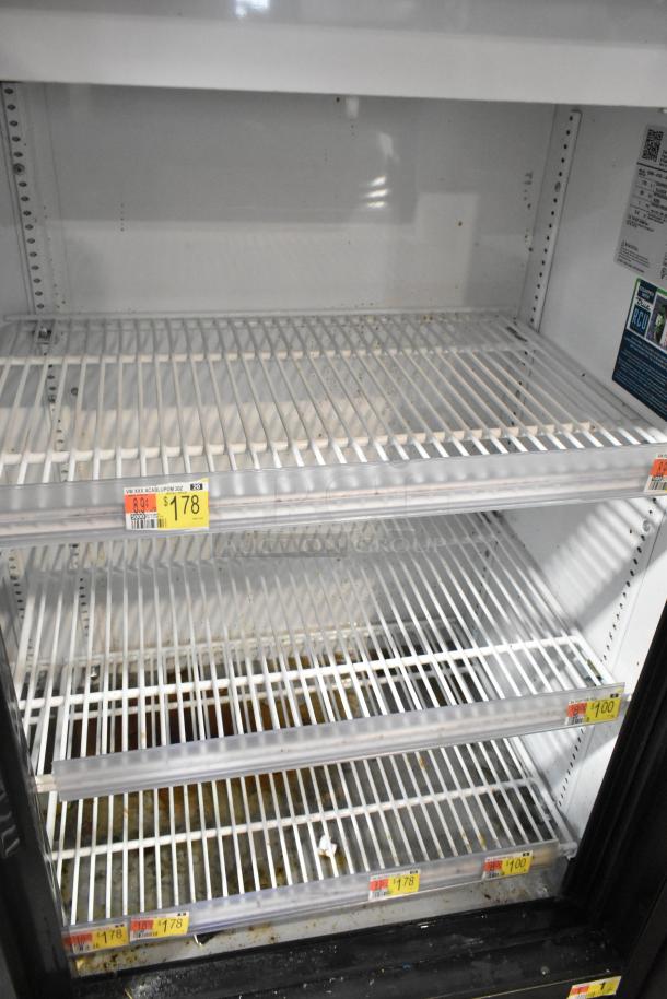 2019 True GDM-41SL-48-HC-LD 2-door cooler with poly-coated racks, white interior, visible price tags, 115 volts, 1 phase.