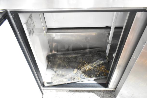 True TWT-72 stainless steel work top cooler with back splash, open interior showing condition. 115 Volts, 1 Phase.