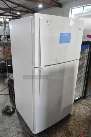 Whirlpool WRT511SZDW00 white fridge with freezer, 115V, 1 phase. Visible label and minor wear. Auction item.