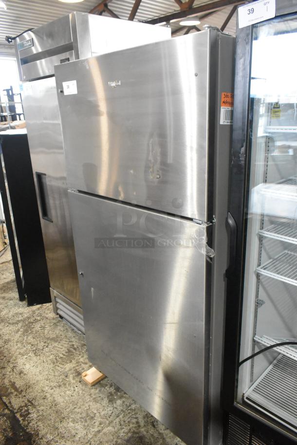 2025 Whirlpool 21MSTFATR6 stainless steel cooler with freezer, 115V, 1 phase. Minor cosmetic wear visible.