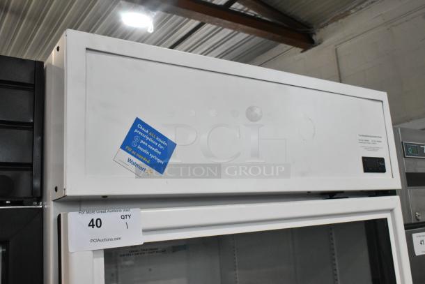 2021 True TSCI-600R-G-PH commercial cooler, single door, glass front, poly-coated racks, 115V, 1-phase, near mint condition.