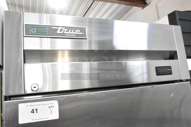 2022 True T-19F-HC commercial stainless steel single door reach-in freezer with poly coated racks, 115V, 1 phase, digital display.