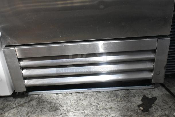 2022 True T-19F-HC commercial single door freezer, stainless steel, poly-coated racks, 115V, excellent condition.