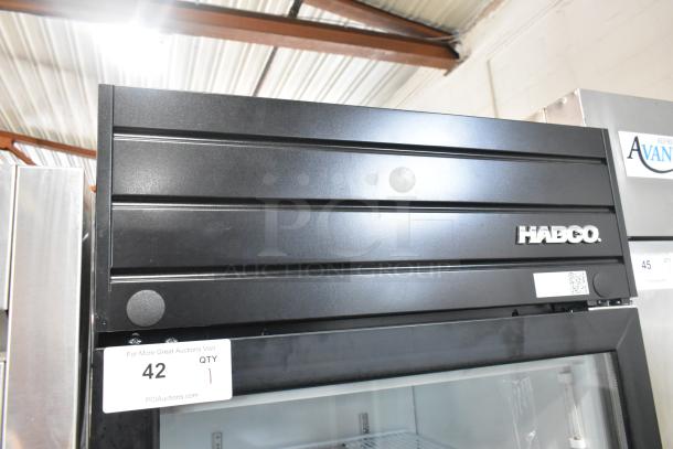 2019 Habco SE18 metal commercial single door reach-in cooler with poly coated racks, black finish, 115V, 1 Phase.
