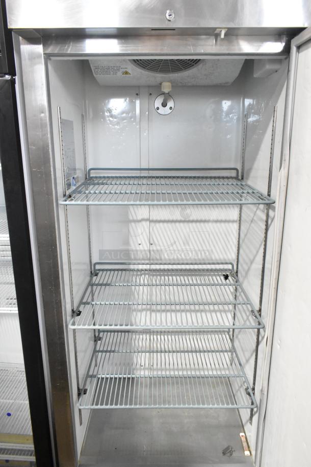 Avantco 178A19RHC stainless steel single door reach-in cooler with three adjustable wire shelves on commercial casters.