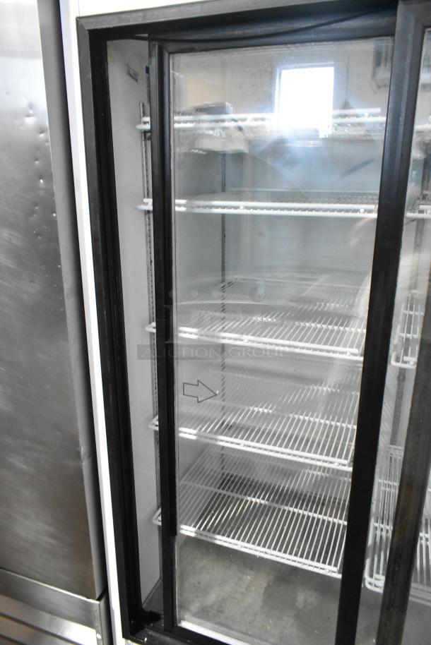 Beverage Air MT38 metal commercial 2-door reach-in cooler with poly-coated racks, 115 volts, 1 phase, visible wear.