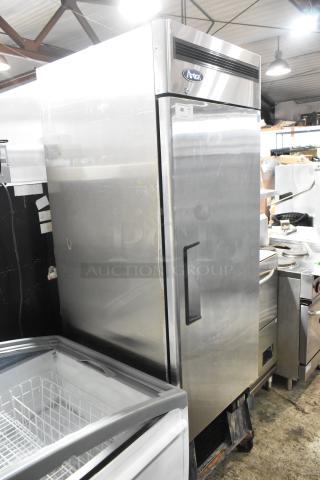 Atosa stainless steel commercial single door cooler with poly-coated racks, on casters. 115 volts, 1 phase.