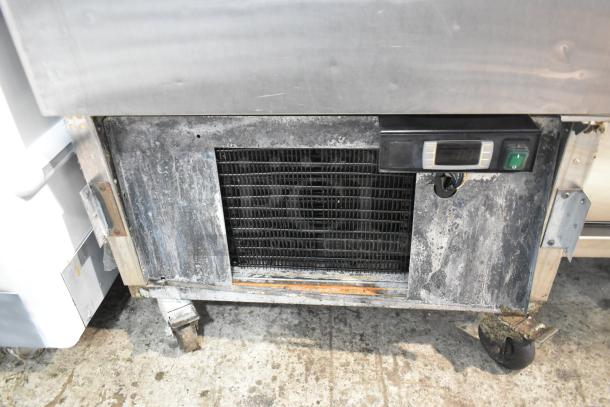 Atosa Stainless Steel Commercial Single Door Reach In Cooler with poly-coated racks on casters. 115V, 1 phase.